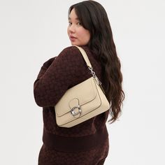 The Soft Tabby reimagines our structured take on an archival 1970s Coach design with a slouchy relaxed feel. Finished with our Signature hardware for an iconic touch this smooth leather shoulder bag features zip pockets inside and out to organize small accessories and two detachable straps to carry by hand style as a short shoulder bag or wear crossbody. | Coach Soft Tabby Shoulder Bag - Women's - Silver/ivory Coach Fall Satchel Shoulder Bag, Classic Daily Use Shoulder Bag With Cc Turnlock Closure, Classic Shoulder Bag With Cc Turnlock For Daily Use, Classic Satchel With Cc Turnlock Closure, Coach Everyday Shoulder Flap Bag, Classic Shoulder Bag With Cc Turnlock Closure For Everyday, Classic Flap Bag With Cc Turnlock For Work, Rectangular Shoulder Bag With Cc Turnlock For Work, Everyday Coach Flap Bag