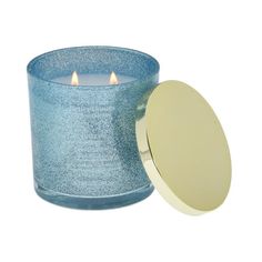 a blue candle holder with two lit candles