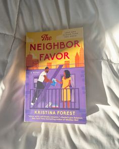 the neighbor flavor book is laying on a bed