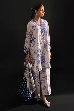 Printed Silk Sets For Summer, Silk Sets With Printed Motifs For Spring, Silk Summer Sets With Printed Motifs, Silk Sets For Daywear, Elegant Floral Print Patterned Sets, Elegant V-neck Printed Sets, Elegant Patterned Sets With Printed Motifs, Spring Silk Lawn Suit With Floral Print, Elegant Patterned Spring Sets