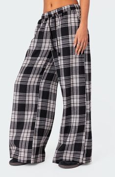 Lounging at home has never looked as good as it does in classic plaid pants cut in a breezy wide-leg silhouette with a comfortable drawstring waistband. Elastic/drawstring waist Front slant pockets 50% cotton, 50% polyester Machine wash, line dry Imported Target Pajamas Pants, Cheap Casual Sleep Shorts, Cheap Knee-length Loungewear Shorts, Cheap Relaxed Fit Pajama Shorts For Loungewear, Cheap Relaxed Fit Pajama Shorts For Bedtime, Cheap Athleisure Pajama Shorts, Unique Pj Pants, Victorias Secret Pajama Pants, Flannel Pajama Pants Nordstrom