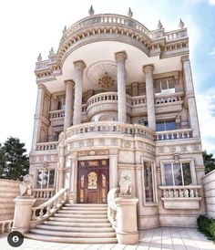 a large white building with stairs leading up to it