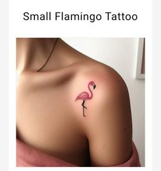 a small flamingo tattoo on the back of a woman's shoulder and chest