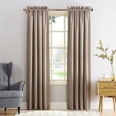 a living room scene with focus on the curtains