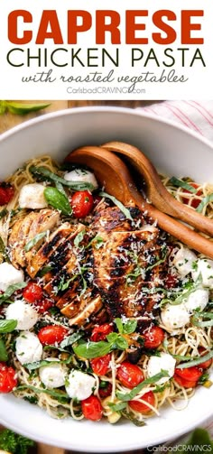 chicken pasta with tomatoes, mozzarella and parmesan cheese in a white bowl