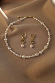 Embrace timeless elegance with our real pearl choker necklace, a stunning choice for brides or a perfect birthday gift. This freshwater pearls necklace exudes dainty charm, making it ideal as bridesmaid jewelry. Elevate your style with the sophistication of genuine pearls. 🌸👰✨ Real Pearl Choker Necklace, Bridal Necklace, Freshwater Pearls Necklace, Dainty Pearl Jewelry, Birthday Gift, Bridesmaid Jewelry Chocker Necklace, Necklace Bridal, Pearls Necklace, Pearl Choker Necklace, Charm Making, Real Pearls, Jewelry Birthday, Perfect Birthday Gift