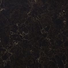 a black marble textured surface with dark colors