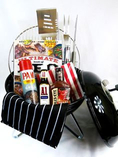 a grilling basket filled with cooking utensils