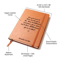 a brown leather bound book with words and labels on it