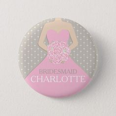 a button with a bridesmaid in a pink dress holding a bouquet of roses