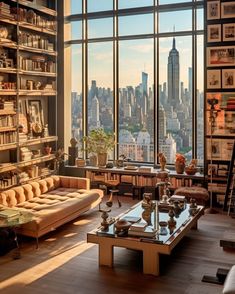 a living room filled with lots of furniture and tall buildings in the background at sunset