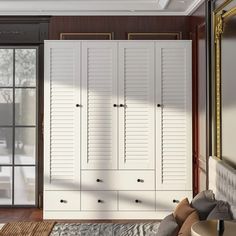 a bedroom with a bed, dresser and closets in it's center area