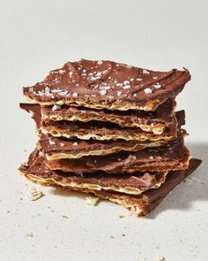 a stack of chocolate bars with sea salt on top