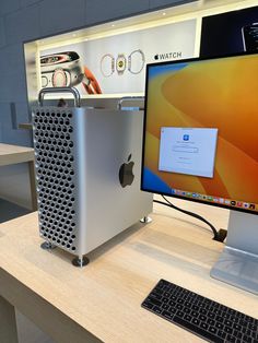 an apple desktop computer sitting on top of a desk