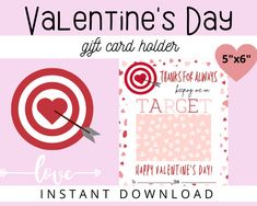 valentine's day gift card holder with an arrow and target in the center on pink background