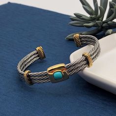 Silver Twisted Cable Bangle With Gold Accents And A Turquoise Stone On The Center Faux Stone Measurement: 6.5" Hippie Jewelry Bracelets, Witch Bracelet, Kate Spade Bracelet, Open Bangle Bracelet, Boho Cuff, Brighton Bracelets, Hamsa Bracelet, Cable Bracelets, Swarovski Bracelet