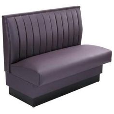 an upholstered purple bench with black legs