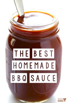 the best homemade bbq sauce in a glass jar with a spoon on top and text overlay