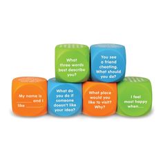 six colorful dices with words on them that say what is best describe what you do