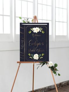 an easel with a sign that says welcome to everyone else's bridal gown