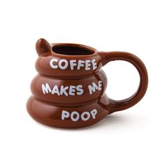 two coffee mugs with the words coffee makes me poop on them