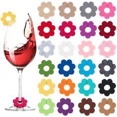 a wine glass filled with lots of different colored flowers