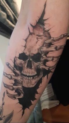 a tattoo with a skull on it