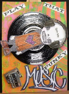 an art project made out of old vinyl records and music memorabilia, with the word play that makes music written on it