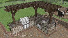 an outdoor kitchen with grill and seating area