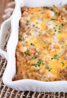 a casserole dish filled with meat and cheese