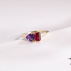 Toi et Moi Trillion Cut Amethyst & Emerald Cut Lab Grown Ruby Engagement Ring/ Solid Gold Double Stone Wedding Ring/ Anniversary Gift The pics show 1CT Trillion Cut Amethyst <6.5 mm> + 1CT Emerald Cut Lab Grown Ruby <5*7 mm> 🥰 Details: Center Stone: Trillion Cut Amethyst & Emerald Cut Lab Grown Ruby ⭐ Cut: Excellent ⭐ Carat and Dimension: Trillion Cut Amethyst: 1 Carat <6.5 mm>, 1.5 Carat <7.5 mm>, 2 Carat <8 mm>, 2.5 Carat <8.5 mm> pictured, 3 Carat <9 mm>, 3.5 Carat <9.5 mm>, 4 Carat <10 mm> Emerald Cut Lab Grown Ruby: 1 Carat <5*7 mm> pictured, 1.5 Carat <5.5*7.5 mm>, 2 Carat <6*8 mm>, 2.5 Carat <6.5*8.5 mm>, 3 Carat <7*9 mm>, 3.5 Carat <7*10 mm>, 4 Carat <8*10 mm> CUSTOM ORDER (You are free to choose main stone weight. I'm happy to custom rings for you!) 👍 Contact me for design modif Amethyst And Ruby Engagement Ring, Ruby And Amethyst Ring, Amethyst And Ruby Ring, Purple Ruby Ring With Center Stone For Wedding, Purple Ruby Ring With Accent Stones For Wedding, Purple Ruby Wedding Ring With Accent Stones, Trillion Cut Gemstone Birthstone Ring For Wedding, Purple Ruby Ring For Wedding, Gold Amethyst Wedding Ring With Gemstone Accents