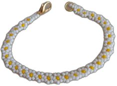 White Daisy-shaped Jewelry For Spring, White Daisy-shaped Spring Jewelry, White Summer Jewelry For Friendship, Trendy White Daisy-shaped Jewelry, Trendy White Daisy Shaped Jewelry, White Dainty Flower Shaped Beaded Bracelets, Elegant White Bracelets For Summer, White Spring Jewelry For Friendship, White Jewelry For Spring Gifts