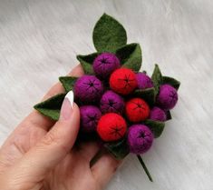 "\"Felted flower brooch, Felted jewelry, red berries brooch , Felt pin, Felt brooch, Wet pin, Fall brooch for woman, Purple berries\". Just imagine how many unique looks you'll create with this lovely brooch: With summer dress Bright! On a hat.... Wow! On a handbag Stylish! On a coat Perfect! Your idea? ;-) This pin is almost weightless, soft and very comfy to use. Photo doesn't show how beautiful real colors are. It is a made-to-order items. So, every one is unique but very similar to one pictu Brooch Felt, Purple Berries, Felted Jewelry, Wool Felt Projects, Felt Projects, Felt Jewelry, Needle Felting Projects, Hand Embroidery Flowers, Felt Brooch