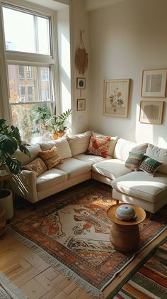 a living room filled with furniture and lots of windows