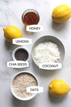 lemons, oats, and honey in bowls on a marble counter top with labels describing the ingredients