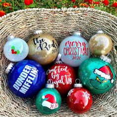 christmas ornaments in a basket on the ground