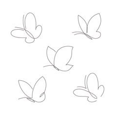 four butterflies flying in the air