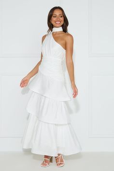 Length from shoulder to hem of size S: 138cm. Chest: 40cm, Waist: 32cm, across front only of size S. Maxi dress. Semi-lined. Model is a standard XS and is wearing size XS. True to size. Non-stretch. One shoulder. Neck wrap. Tiered frill skirt. Crinoline hem. Zipper with hook eye closure. Cold hand wash only. Polyester. We adore the Cara One Shoulder Maxi Dress for all our fancy events. Featuring a neck wrap, a tiered frill skirt and a crinoline hem for a voluminous appearance. Style with heels a One Shoulder Maxi Dress, Frill Skirt, Maxi Dress White, Bridal Shower Dress, Long Bodycon Dress, Maxi Dress Prom, Shower Dresses, Halter Maxi Dresses, Neck Wrap