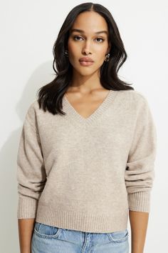 This soft knit sweater is designed to have a relaxed fit. With Heavenlyarn™, you'll love showing off your softer side. Features - V-neck Size & Fit - Relaxed fit - Stretch fabric - Model is wearing size XS Materials & Care - 50% recycled polyester, 46% polyester, 4% spandex - Hand wash, cold - Imported Check And Balance, How To Show Love, Brown Sweater, Sweater Pattern, V Neck Sweater, Soft Knits, Vneck Sweater, Neck Sweater, Knit Sweater