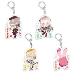 three key chains with anime characters on them