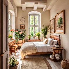 a bed sitting in a bedroom next to a window with potted plants on it