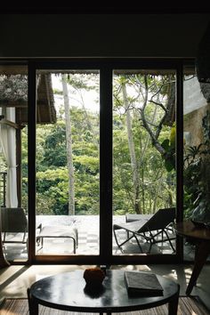 an open living room with sliding glass doors