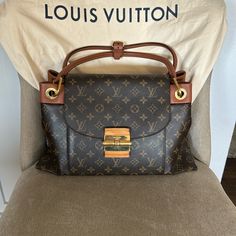 Lv Olympe Monogram Canvas Shoulder Bag. Has Two Main Pockets On Inside With Two Pouch Pockets On Each Side. Zipper Pocket In Middle. Zipper Pocket On Outside Along With A Pouch Pocket On Other Side. Inside Is Very Clean With No Spots Or Smell. Very Roomy And Very Good Pre-Loved Condition. Bottom Feet Are Nice And All Gold Hardware Is In Good Condition. All Zippers Compartments Work Great. The Only Call Out Would Be The Vachetta Leather On Front Closure Has A Small Discoloration. Brand/Date Code Canvas Shoulder Bag, Monogram Canvas, Pocket Pouch, Gold Hardware, Louis Vuitton Bag, Side Zipper, Zipper Pocket, Bag Lady, Louis Vuitton