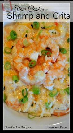 a white plate topped with shrimp and grits covered in gravy, garnished with green onions