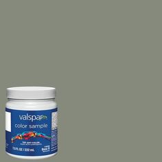 a bottle of valpspar color sample on a gray background