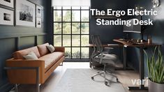 the ergo electric standing desk is next to a couch and chair in an office