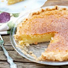 a pie sitting on top of a glass plate