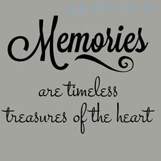 the words memories are timesless treasures of the heart on a gray background with black lettering