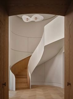 a spiral staircase in the middle of a room