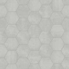 an abstract hexagonal tile pattern in grey and white